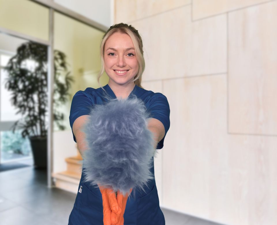 Eine Mitarbeiterin der CleanVision Grundreinigung Köln